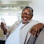 Man_Black_60s-70s_UsingPhone_HomeLivingRoom1