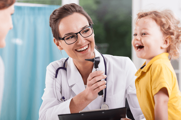 Happy little boy after health exam at doctors office_592