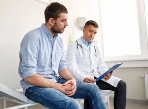 man at doctor appointment